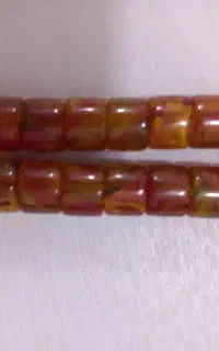 یک عدد تسبیح کهربا طرح ابر و بادی