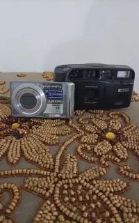 یک عدد دوربین عکاسی و یک عدد فیلمبرداری