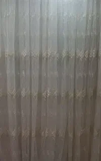 پرده تور کار شده