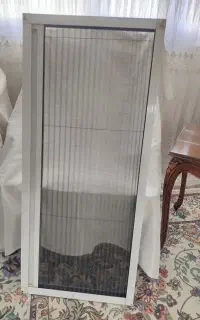 توری پلیسه پنجره آشپزخانه