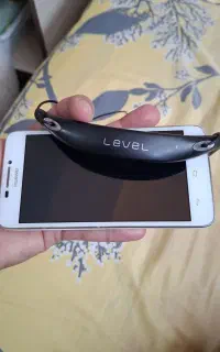 گوشی هواوی g630 و هندزفری گردنی