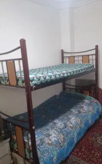 تخت دوطبقه فلزی با پله و محافظ