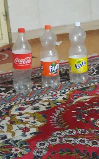 یک ونیم لیتری نوشابه ای