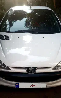 پژو ۲۰۶ تیپ ۲  سفید  کم کار  بسیار تمیز  مدل ۱۴۰۱