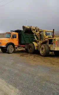خاک برداری، حمل نخاله، با لودر کمپرسی