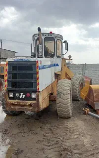 خدمات خاکریزی، خاک برداری، تخریب، تسطیح با لودر