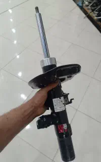 تعمیرات فوق تخصصی کمک فنر با گارانتی یکساله