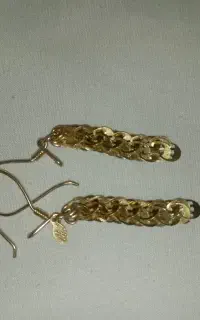 گوشواره  ۱۰۰ بالای خام