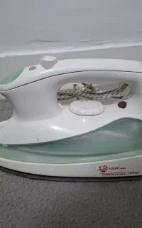 اتو لباس کاملا تمیز و سالم