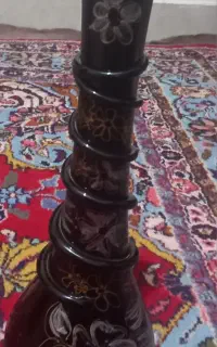 مجسمه و گلدان