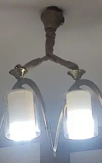 لوستر دوشاخه دو لامپ می‌خورد نونو