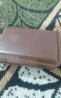 کیف پول داخل مغازه کنار پلیس راه ماهان جا مونده