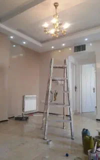 رنگ آمیزی ساختمان با ایرلس نقاش رنگ کناف بتونه