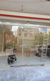 شیشه سکوریت‌کرکره برقی‌بالکن شیشه ای اقساطی