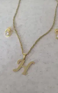 پلاک و گوشواره نو رنگ ثابت