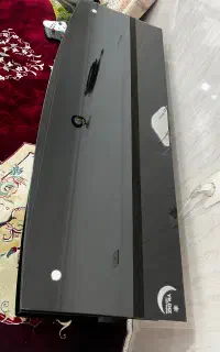 میز تلویزیون شیشه ایی ضد ضربه
