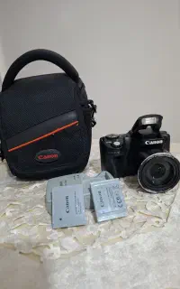 دوربین کنون SX510HS در حد نو  با دو باطری