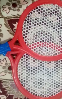 تنیس و تفنگ اسباب بازی