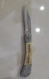 یک عدد چاقو آنتیک با دسته آج فیل از برزیل اومده