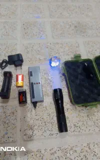چراغ قوه یووی وسختی سنج سنگ
