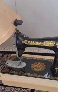چرخ خیاطی وعروسک
