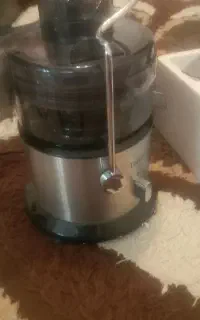 آبمیوه گیری کنو