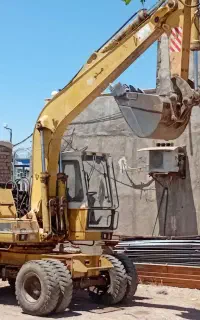 بیل مکانیکی لاستیکی اچ ای ۱۰۰.مینی بیل