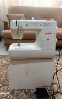 چرخ خیاطی و گلدوزی