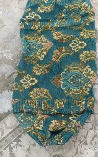 روبالشی فیروزه ای