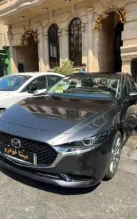مزدا 3 وارداتی مشکی خاکستری سفید داخل مارون۲۰۲۴/۲۵