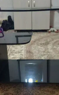 میز تلویزیون شیشه‌ای