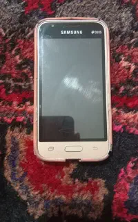 یک عدد گوشی J1 جی وان
