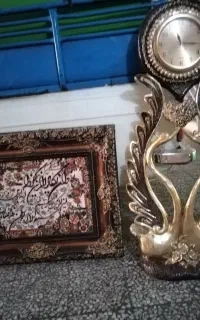 ساعت ایستاده و تابلو فرش