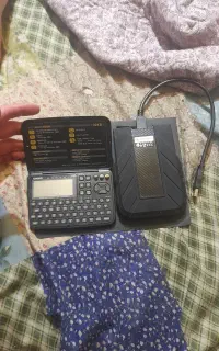 هارد دیسک ۲ ترابایت ADATA و ماشین حساب  casio