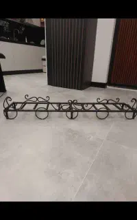 استند فلزی برای گذاشتن هیزم داخل شومینه