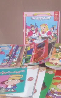 کتاب داستان و چرخ خیاطی