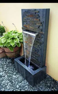 محوطه سازی.آبشار.آبنما.سنگ لاشه کف و نما