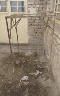 چهار پایه کولر  و بشکه خالی