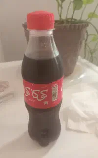 نوشابه سیصد سی سی ده شل