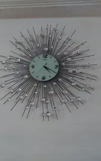 ساعت دیواری طرح خورشیدی نگین دار