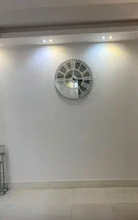 ساعت آینه ای و تابلو آینه ای