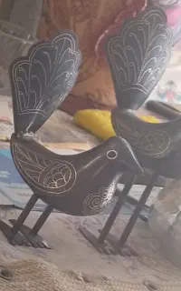 گنجشک نقره کوب علامت
