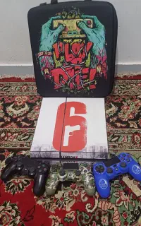 کنسول ps4 fat 1tra با سه عدد دسته و کیف