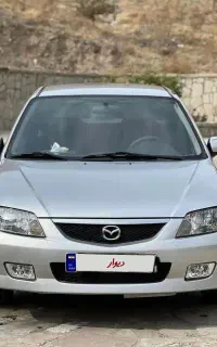 مزدا۳۲۳تبپ۴دنده اتومات مدل۱۳۸۴کم‌کار وفابریک