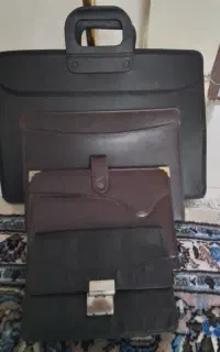 کیف و کلاسور و ماشین حساب