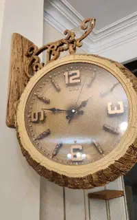 ساعت دیواری دو طرفه