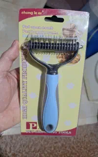 یک عدد  برس گره باز کن برای  گربه پرشین