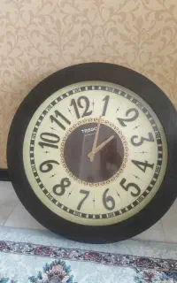 ساعت دیواری طرح چوب