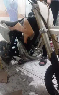 کامیکی 125+کی تی ام مینی کراس