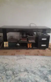 زیر تلویزیونی شیشه ای کشودار
